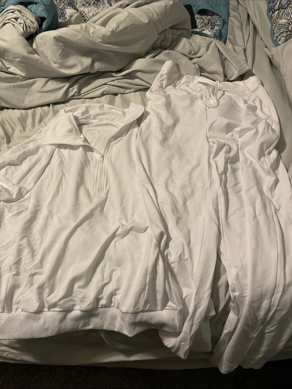 White sweat suit top and pants